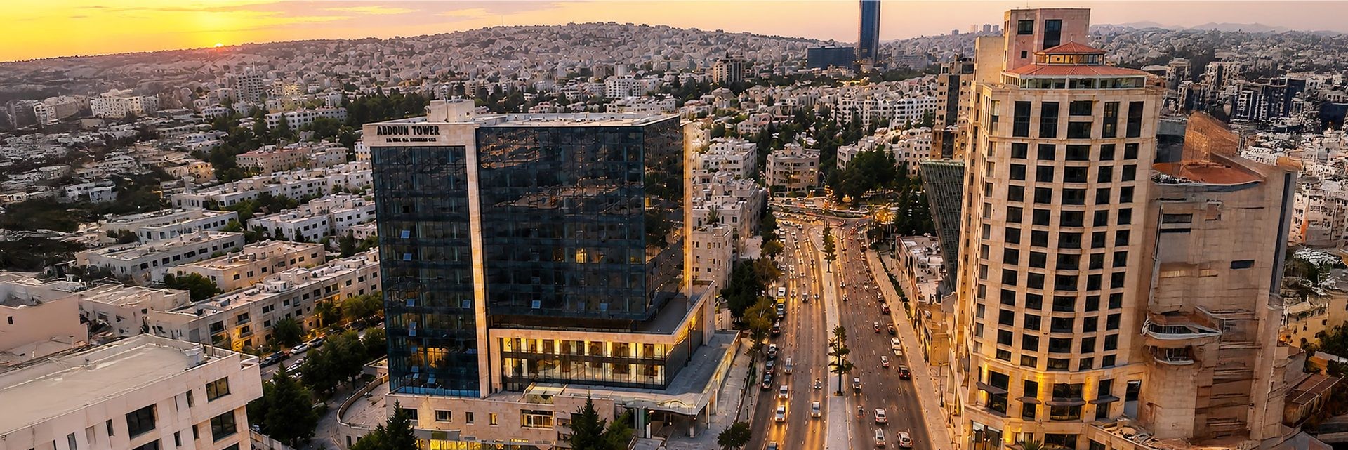 Aerial view of Amman, Jordan at sunset — Abdoun Tower and the city skyline